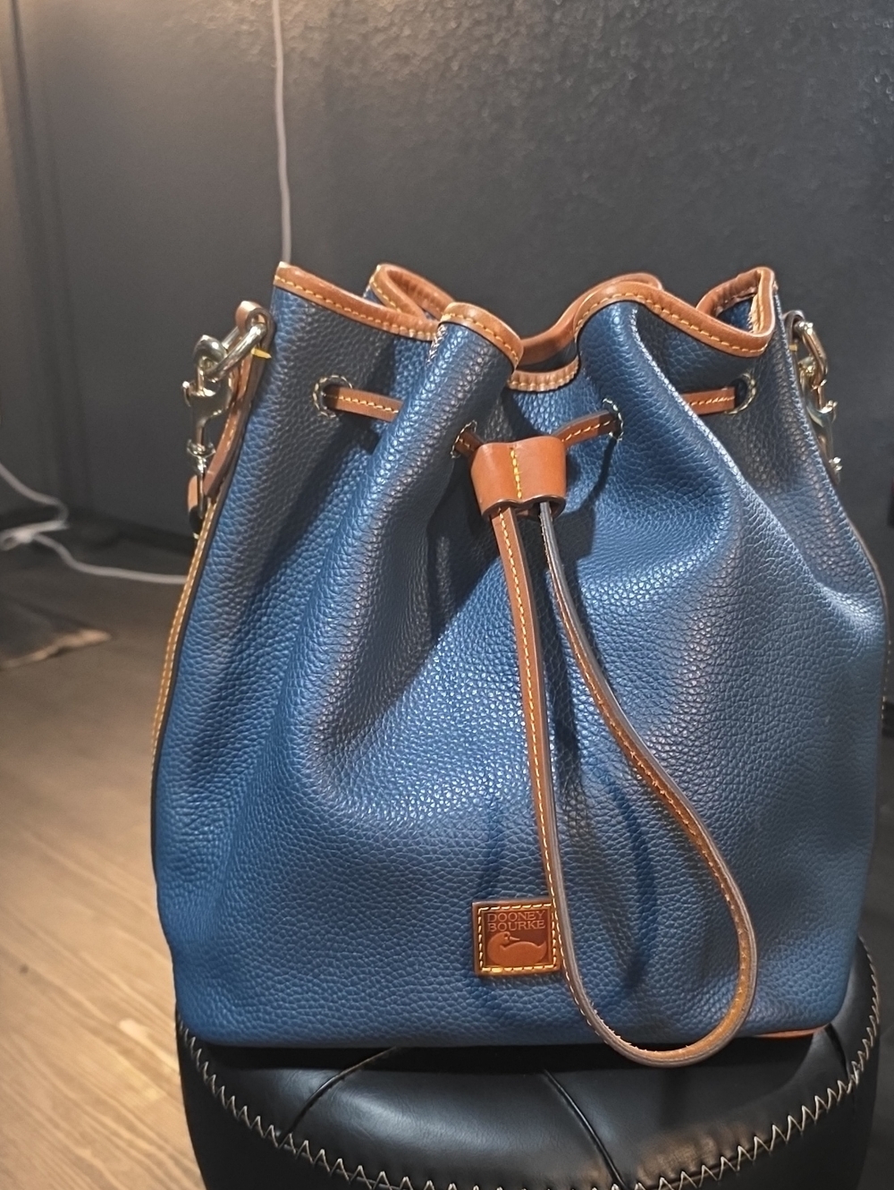 Dooney & Bourke Navy Blue Pebbled Leather Drawstring Bucket Bag with Tan Trim